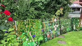 Huge garden border painting showing how it was created.