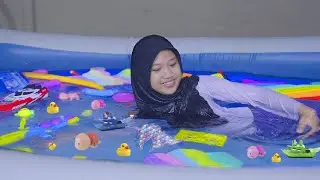 Drama | Dinda Swimming in a Pool Full of Toys