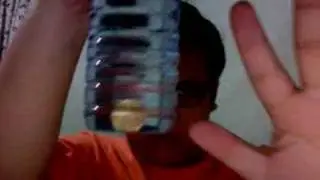 Coin through Factory sealed bottle trick