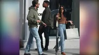 Scott Disick leaves bank besides huge bodyguard carrying a Gucci bag that looks stuffed with