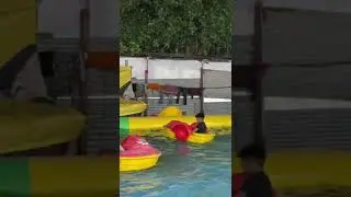 children enjoying manmade boating pool