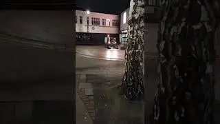 cleaning dust from the town square, early in thr morning
