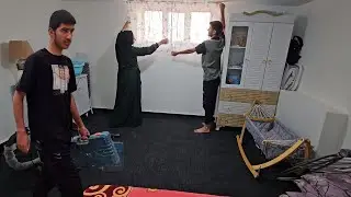 A life of love and adventure; installing curtains with the help of Abolfazl
