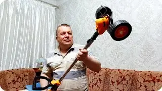 Unpacking a battery-powered wheeled trimmer. Purchased for a summer house at Leroy Merlin.