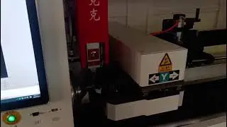 6009K 1500W fiber laser pipe cutting machine with fully automatic pipe feeder and protective cover