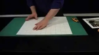 Mounting a photo or print by hand onto self adhesive board