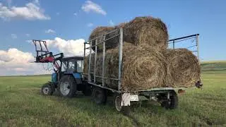 Заготовили 160 рулонов сена . Возим домой .