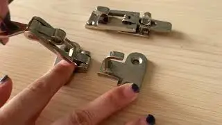 Anti rattle swivel safety hasp