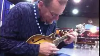 Adam Steffey checks out a Sorensen Sprite Two-Point Mandolin