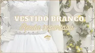 Vestido longo branco com renda importada.