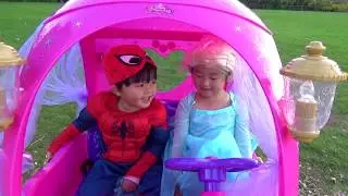 Elsa & Spiderman Riding Disney Princess Carriage Powerwheel at the Playground