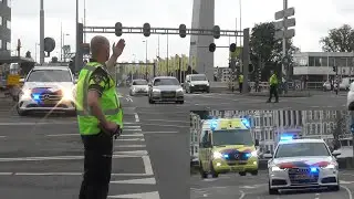 Politie zet drukke kruising stil voor passeren spoedtransport Ambulance naar het ziekenhuis! 