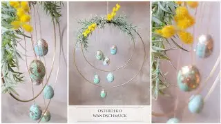 Osterdeko Wandschmuck oder Türkranz mit Metallring und Eier