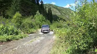 LADA 4X4 Niva. Road along the Achik Pass. Repeater at the White Boma. 5th series. Mountain Altai