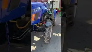 Полноприводный трактор Синтай 244 с передним портальным мостом. 