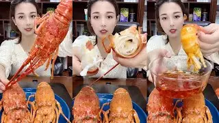 The cute girl eating lobster of seafood # 322
