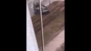 A Russian tank swerves & runs over civilian car