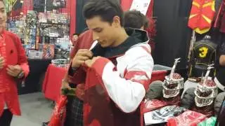 Andrew Gray wears Goseiger Red Ranger jacket at Morphicon 2016