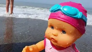 Dolls swimming in the pool