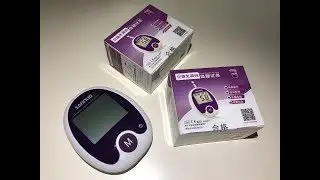 Китайский глюкометр Sunnuo фиолетовый и иглы с Алиэкспресс.