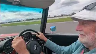 The MercedesBenzClub w113 Pagoda roaring around Silverstone track celebrating 60 years.