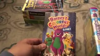 A Dragon Tales VHS Tape with Barney VHS Tapes