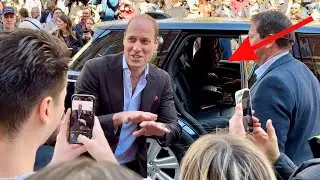 Kate ￼patiently waits for Will while he greets fans!