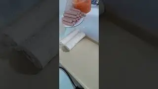 Сосиска в лаваше с корейской морковью.