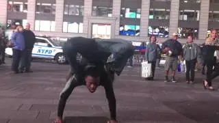 Man in Times Square NYC double jointed