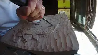 Bassorilievo su legno 