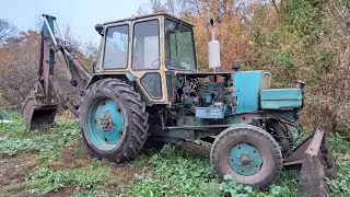 Копаю на экскаваторе ЮМЗ канал на дне пруда dripping on the excavator pond