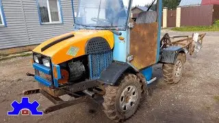A homemade mini tractor with a breakaway design, on shortened Volga axles. It plows with four bod...
