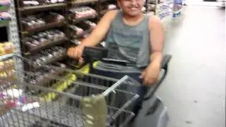Phuc Riding a Handicap Electronic Cart at Food4Less