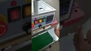 Máy hàn miệng túi kiểu đứng, máy seal liên tục
