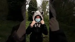 wolf therian walking around with wolf hat and big fluffy tail - also a furry
