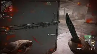 a knife in one hand, door handle in the other