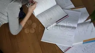 Female Studying On Floor. Stock Footage