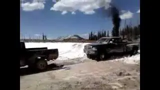 Nissan Pulling a Dodge dually Cummins!!!