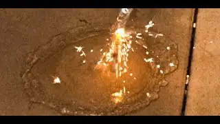 Sparkler under water jet and in metal tube. 4k 60fps
