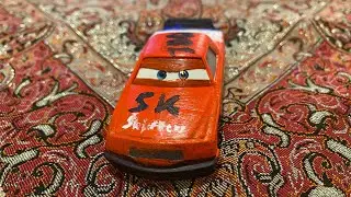 Disney Pixar Cars Diecast John DeCargo (SK Shifters Racer Number 100)