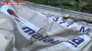 Постановка крушения боинга 17 07 2014 Сгруженная автокраном куча хлама в куске фюзеляжа