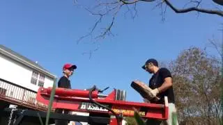 Splitting some wood with the family.