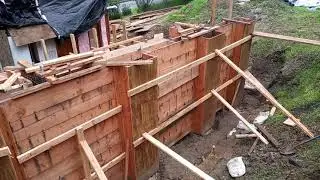 Veterans concrete,...back of retaining wall bracing / pre pour