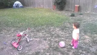 Valencia and Biankah playing in backyard.