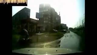 Motorbiker nosedives off bike