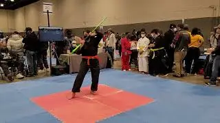 Leah competing in weapons at the Warrior Cup 2022