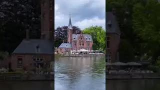 Clouds and water flows in Bruges - Belgium - 