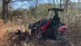 IR2000CF wheel loader running the IRDBC brush cutter