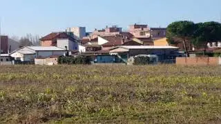 Can you see it? A huge YouTube play button between houses