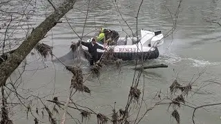 RAW: Indiana deputy serving warrant has to rescue suspect from river